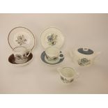 A collection of Susie Cooper tea and coffee wares comprising teapot, milk jug, pair of cups and