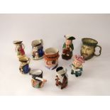 A collection of nine various character and toby jugs including 19th century example in the form of a