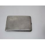 A large silver cigarette case with engine turned decoration, Birmingham 1929, 5.5 oz approx