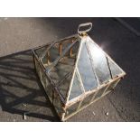 A 19th century iron and glass lantern cloche of usual form with pyramid top