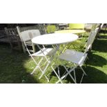 A café table and two matching chairs with a white painted finish