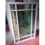 A 19th century leaded light window with geometric detail, 113cm x 76cm