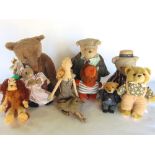 A boxed containing a collection of vintage teddy bears to incldue a Kitty mohair stuffed bear and
