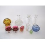 A small collection of glassware including pair of cranberry glass bowls with crimped rims, a further