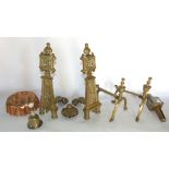 A mixed collection of brassware to include two pairs of fire dogs, copper jelly mould, horse brasses