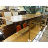 A Danish style teak draw leaf dining table, 212 cm long x 79 cm high approx