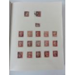 An album containing a used collection of GB stamps from QV to QE