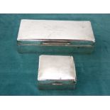 Two silver cigarette boxes