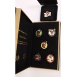 The Golympic Games cased set of five enamel badges 159/2,000 together with a Millennium Golly