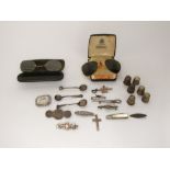 A collection of Victorian and later small silver items to include six thimbles, three salt spoons,