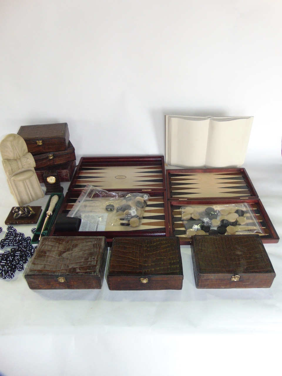 A collection of reproduction and replica antique gaming sets, together with faux leather boxes and