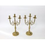A pair of cast brass large twin brach candleabra, 43cm high