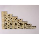 A complete set of 19th century ebony and bone dominoes 0-6