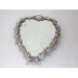 A good quality late 19th century heart shaped dressing table mirror, the silver plated frame