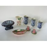 A collection of Maling wares comprising a jug with relief moulded pink blossom decoration, a dish