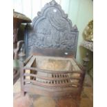 An old English cast iron fire back showing a king alighting from a carriage, 85cm high together with