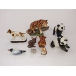 A collection of ceramic animals including a Royal Dux model of a standing panda with pink triangle