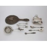 Late Victorian silver purse; together with continental white metal caddy spoon, six novelty spoons