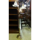 Twin branch standard lamp fitted with ribbon opaque glass shades, 140 cm high approx