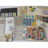 A small stockbook containing a miscellaneous collection of mainly overseas stamps, a quantity of