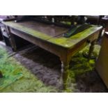 A Victorian farmhouse dining table in pine fitted with single frieze drawer on turned supports,