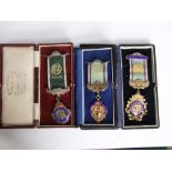 Three Royal Ancient Order of Buffalo medallions, Royal Artillery Lodge in silver and enamel, all