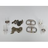A collection of white metal marcasite brooches, 4 silver rings and a pair of paste set buckles