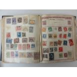 Three stamp albums containing GB, Commonwealth and world stamps