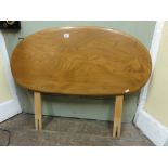 An Ercol light elm single headboard, 100 cm long approx