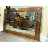 Archibald Knox for Liberty planished copper rectangular wall mirror fitted with three Ruskin