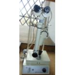 TOC slit lamp opticians machinery together with a collection of opticians slides and spares