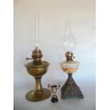 Arts & Crafts oil lamp together with a further oil lamp with mottled glass bowl and a small silver