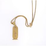 An unmarked yellow metal Egyptian gold plaque pendant with gold rope link chain, 10g approx