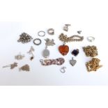 A collection of silver items to include an early 20th century buckle ring plus numerous sterling