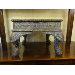 A late 19th century Indian stool or stand, the mahogany framework overlaid with hand worked