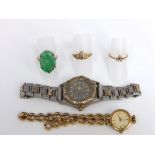 Three 9ct gold rings, one set with carved jade stone, second set with three melee cut diamonds and a