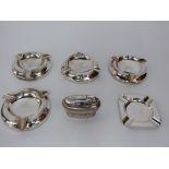 A set of four matching sterling silver circular ashtrays birmigham 1949, together with a further