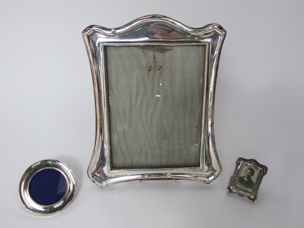 Three silver easel picture frames