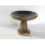 A good antique marble and cast ormolu tazza, the dish top fitted with a band of flowers upon a