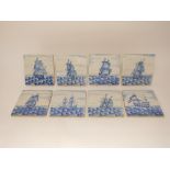 A collection of eight tiles with blue and white painted decoration in the delft manner of sailing