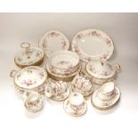 A quantity of Paragon china Victoriana Rose pattern dinner wares comprising a pair of tureens and