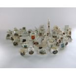 A quantity of crested ceramics including a Willow Art model of the city of Leicester clock tower,