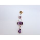 An impressive 19th century, 9ct gold and amethyst pendant necklace with collet-set paste stone;