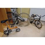 Three various clowning bikes to include a small penny farthing type bike, a micro stunt bike and a