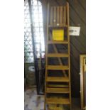 A stripped and waxed pine step ladder