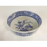 A Masons blue and white printed basin with chinoiserie bird and flowering branch decoration and with