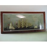 A good 19th century cased wall hanging diorama of a marine scene with three ships off shore, the