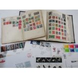 Two stamp albums containing a quantity of British and worldwide stamps including a Penny Red example