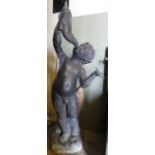 A good quality heavy lead water feature in the form of a standing cherub blowing into a conch shell,