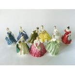 A collection of nine Royal Doulton figures comprising Hilary HN2335, Victoria HN2471, Winsome